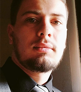 White male with blonde hair and brown eyes. 