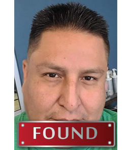 American Indian male with brown eyes and black hair.