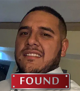 a Hispanic male with brown eyes and brown hair.