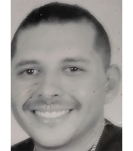 Hispanic or Latino male with black hair and brown eyes.