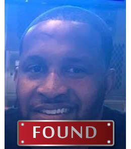 Black male with brown eyes and black hair.