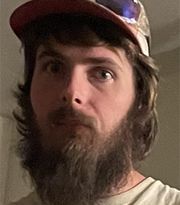 White male with brown hair and brown eyes.