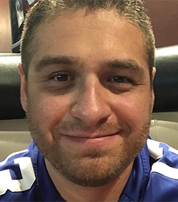 a White male with brown eyes and brown hair