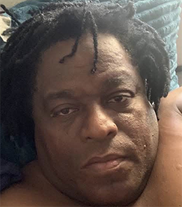 Hispanic or Latino person with black hair and brown eyes.