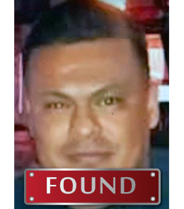 a Hispanic male with brown eyes and black hair.