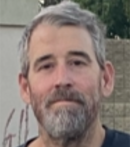 White male with brown hair and brown eyes. 