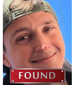 a White male with hazel eyes and brown hair.