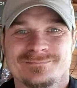 a White male with blue eyes and blonde hair