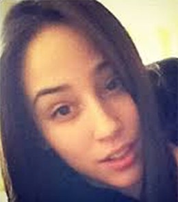 White female with brown hair and brown eyes.