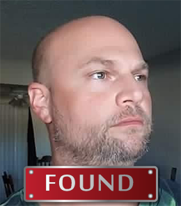 White male with brown hair and hazel eyes.