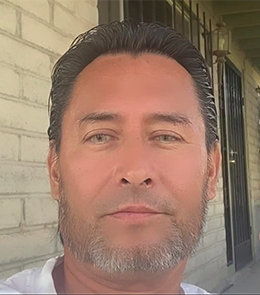 White male with black hair and brown eyes. 
