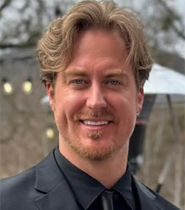 White male with brown eyes and blonde hair.