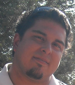 Hispanic male with brown eyes and brown hair.