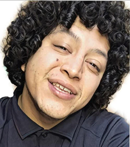Hispanic or Latino person with black hair and brown eyes.