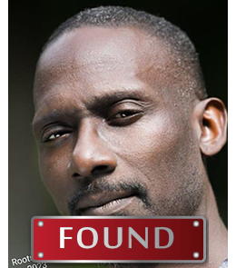 Black male with brown eyes and black hair.