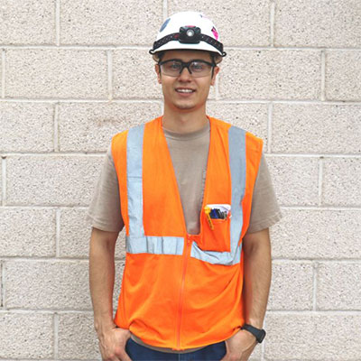 Young man wearing construction clothing. 