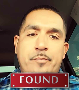 Hispanic male with brown eyes and hair, a beard and mustache