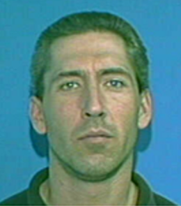 A White male with brown hair, green eyes.