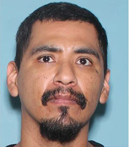 Middle aged Hispanic male with brown eyes, black hair, a mustache, and goatee