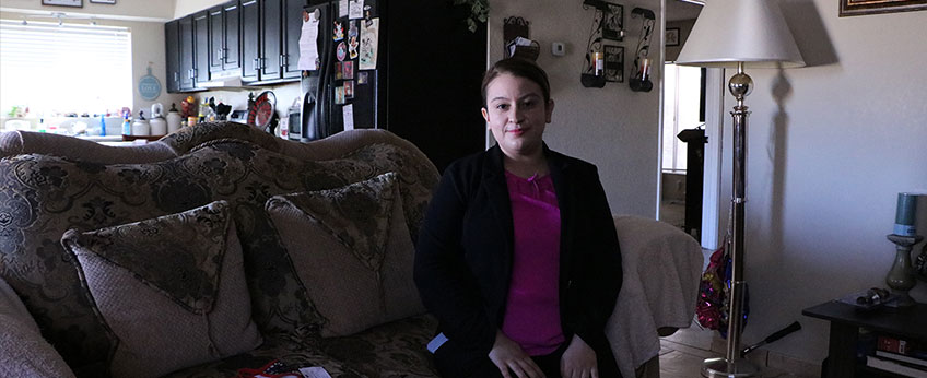 Young woman sitting on a couch