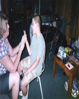 Young man learning American Sign Language