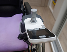 AAC Device Attached to Wheelchair