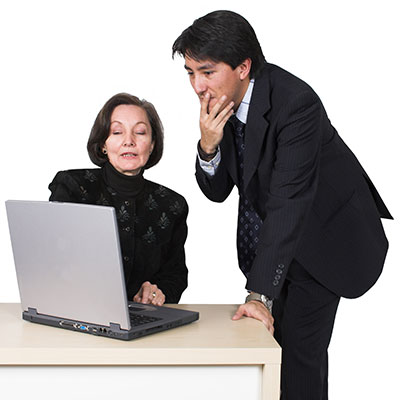 Business Professionals Looking at Laptop