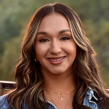 woman smiling directly at camera