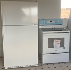 a refrigerator and electric range