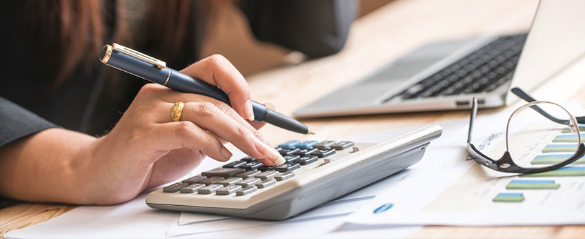 woman using a calculator