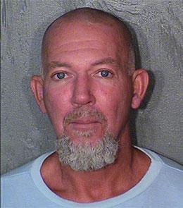 White male with brown hair and blue eyes.