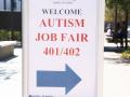 A sign reading Welcome Autism Job Fair