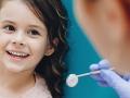 dental hygienist with a little girl
