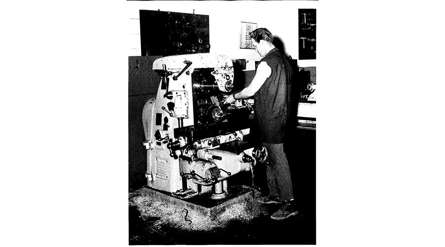 man working with a large machine