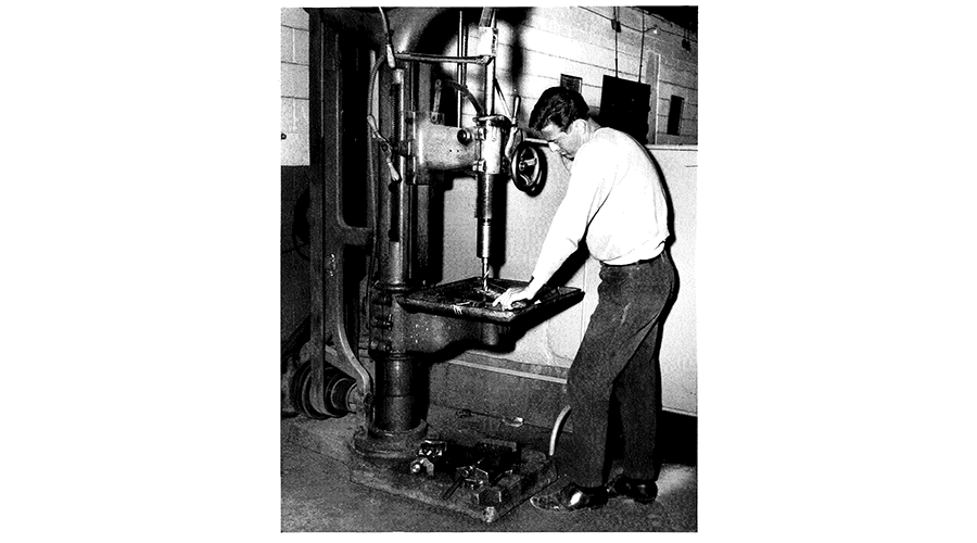 a man working on a large machine