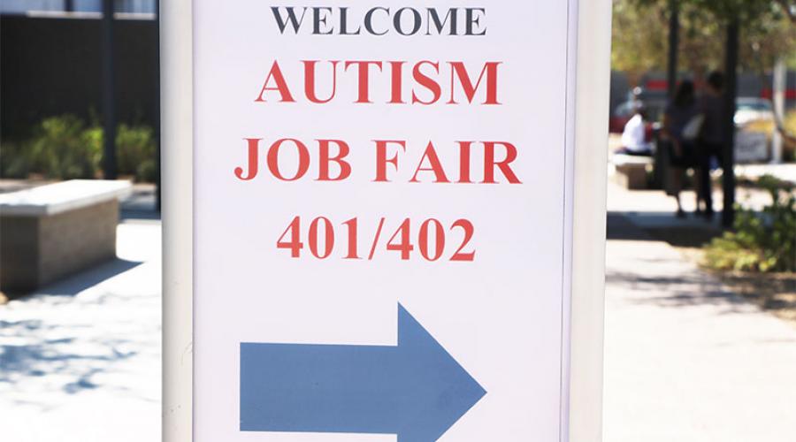 A sign reading Welcome Autism Job Fair