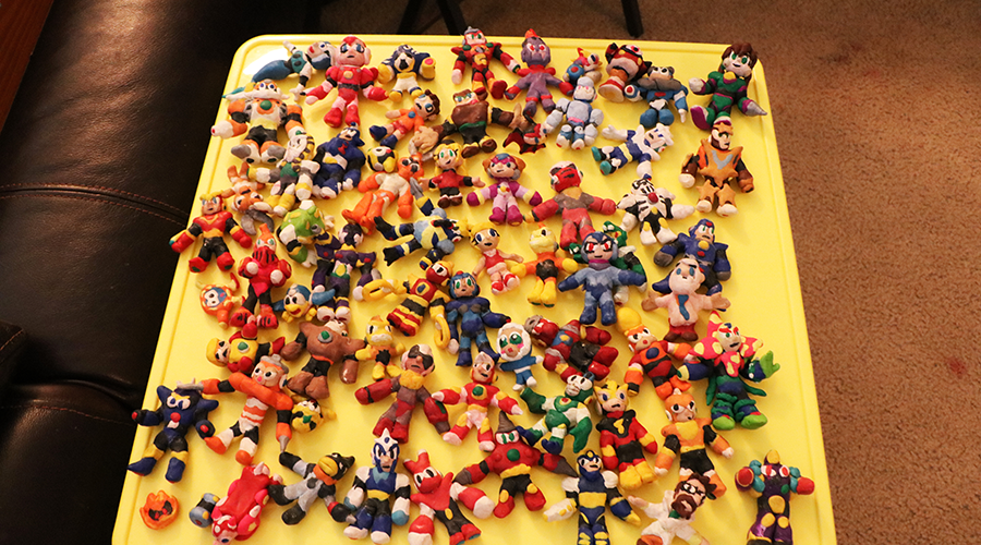 various colorful clay figures displayed on a tray