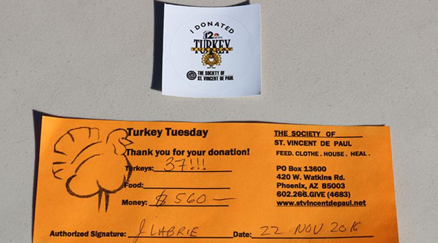 donation receipt showing 560 dollars/37 turkeys