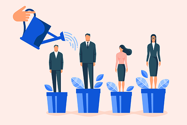 4 business professionals each stand on flower pots; a watering can pours water over them